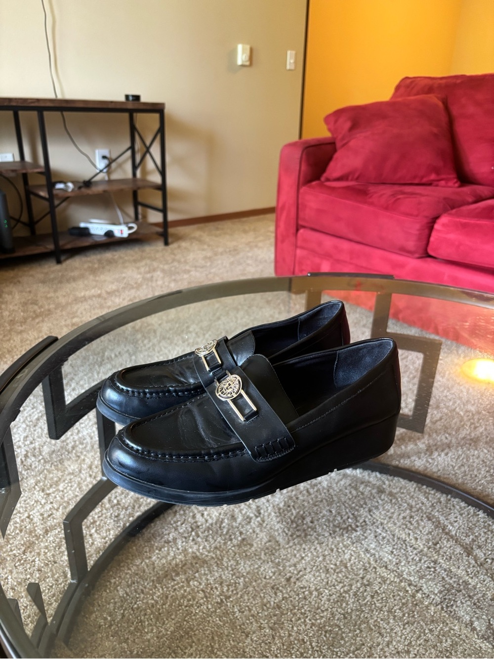 Black Leather Loafers with Decorative Medallion